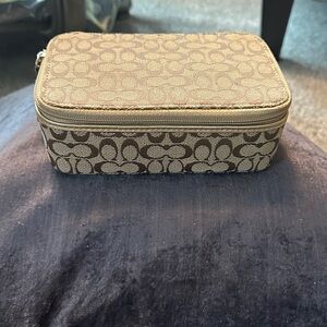 Coach Brown Monogram jewelry case.